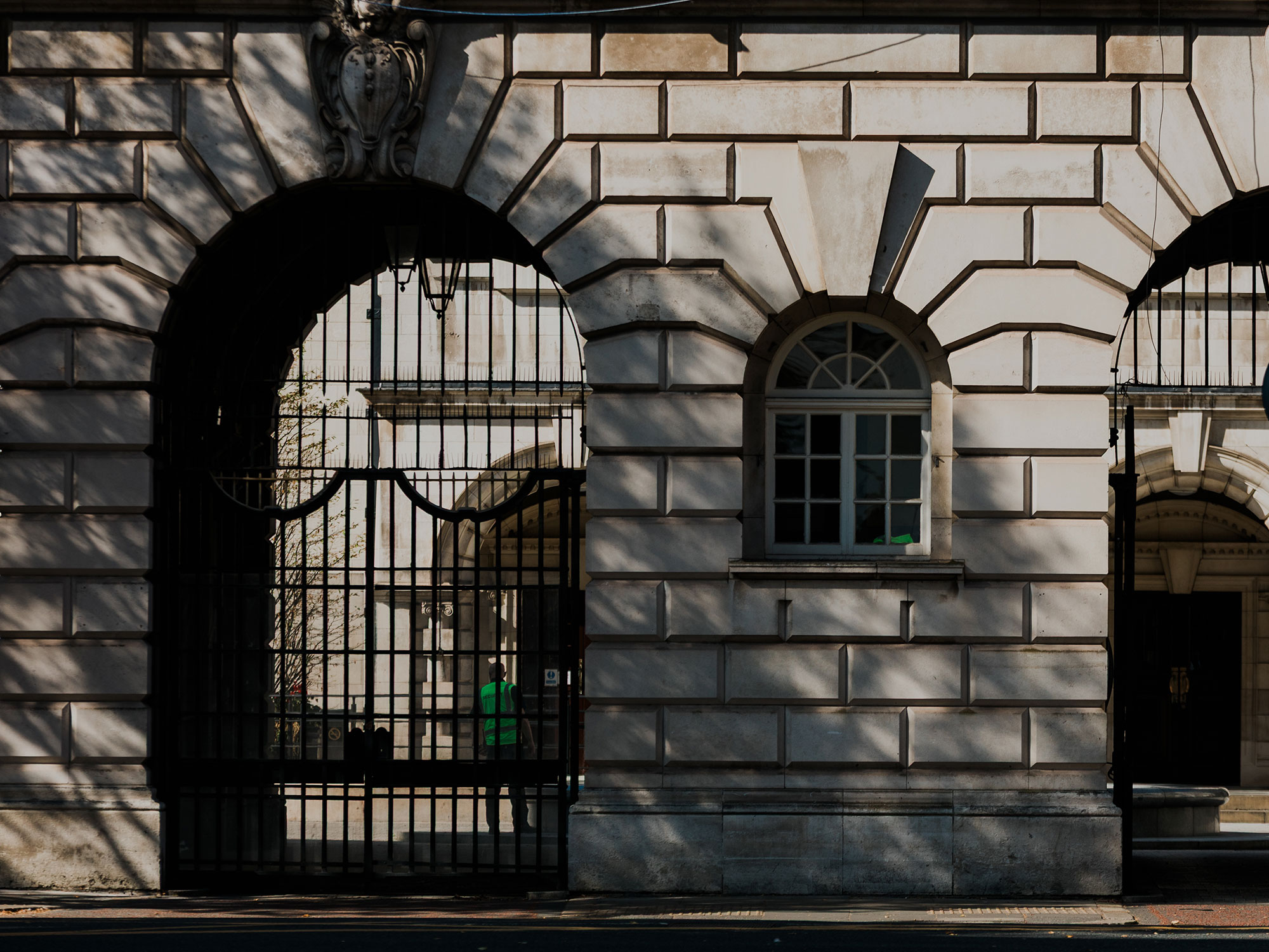 ron gates and stone archway at Belfast City Hall